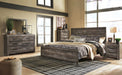 Wynnlow King Panel Bed with Mirrored Dresser, Chest and 2 Nightstands Homeline Furniture