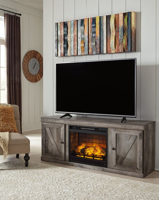 Wynnlow TV Stand with Electric Fireplace Homeline Furniture