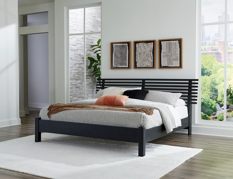 Danziar Queen Panel Bed with Mirrored Dresser