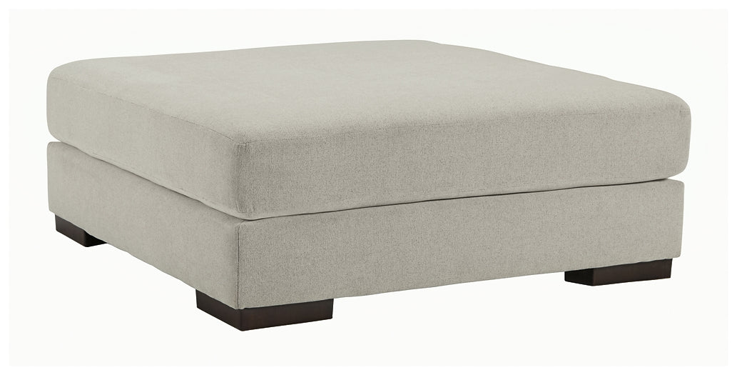 Artsie 4-Piece Sectional with Ottoman Homeline Furniture