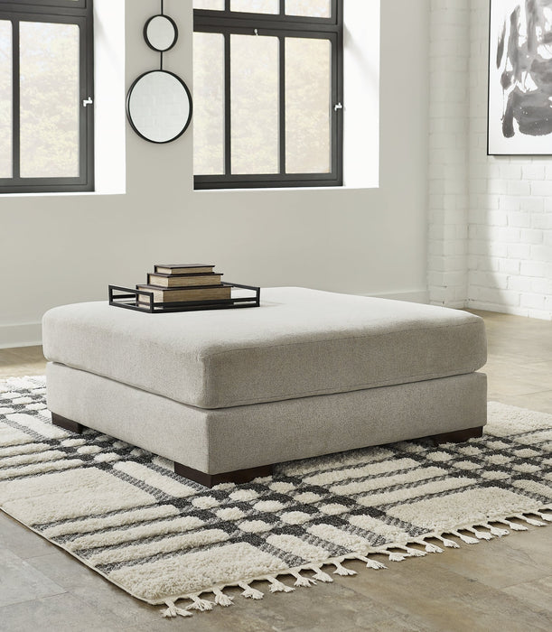 Artsie 4-Piece Sectional with Ottoman Homeline Furniture