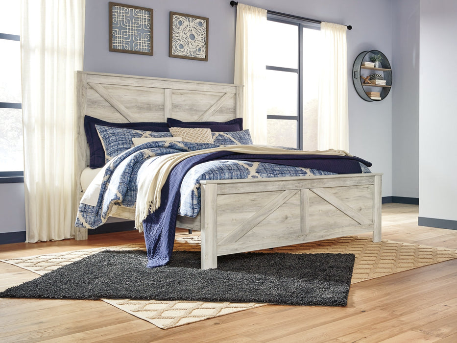 Bellaby Queen Crossbuck Panel Bed with Mirrored Dresser Homeline Furniture