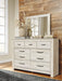 Bellaby Queen Panel Headboard with Mirrored Dresser and Chest Homeline Furniture