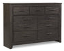 Brinxton King Panel Bed with Mirrored Dresser Homeline Furniture