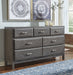 Caitbrook Queen Storage Bed with 8 Drawers with Dresser and Chest Homeline Furniture