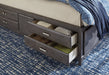 Caitbrook Queen Storage Bed with 8 Drawers with Dresser and Chest Homeline Furniture