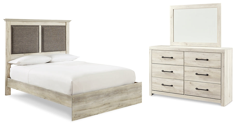 Cambeck King Upholstered Panel Bed with Mirrored Dresser Homeline Furniture