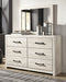 Cambeck Queen Panel Bed with Mirrored Dresser and Chest Homeline Furniture