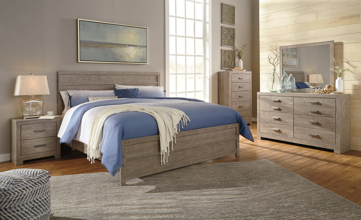 Culverbach King Panel Bed with Mirrored Dresser, Chest and 2 Nightstands Homeline Furniture