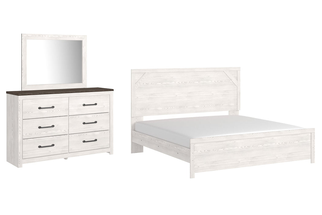 Gerridan King Panel Bed with Mirrored Dresser Homeline Furniture