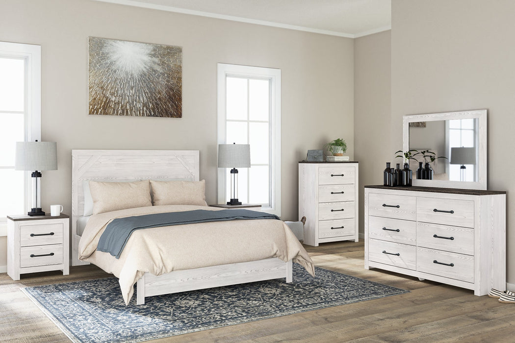 Gerridan Queen Panel Bed with Mirrored Dresser, Chest and Nightstand Homeline Furniture