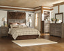 Juararo Queen Panel Headboard with Mirrored Dresser and Chest Homeline Furniture