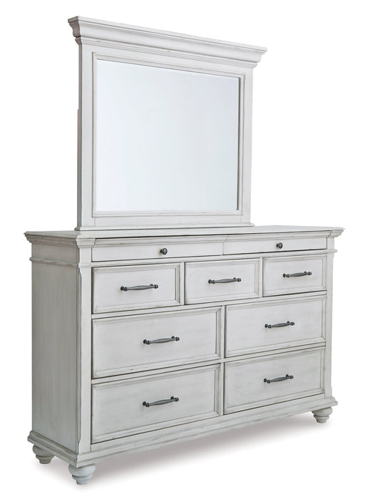 Kanwyn King Panel Bed with Mirrored Dresser, Chest and 2 Nightstands Homeline Furniture