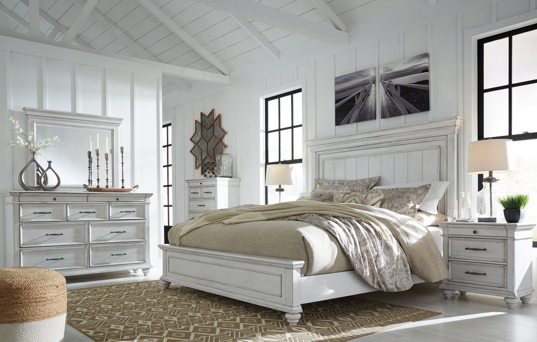 Kanwyn King Panel Bed with Mirrored Dresser, Chest and 2 Nightstands Homeline Furniture