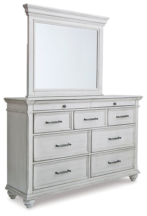 Kanwyn King Panel Bed with Mirrored Dresser Homeline Furniture