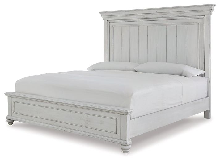 Kanwyn Queen Panel Bed with Mirrored Dresser Homeline Furniture