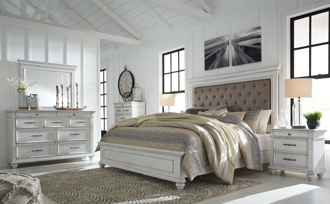 Kanwyn Queen Panel Bed with Mirrored Dresser and Chest Homeline Furniture